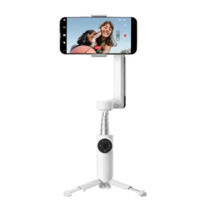 White Insta360 Flow 3-axis gimbal stabilizer with built-in selfie stick and tripod, holding a smartphone displaying a video recording interface.
